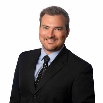 Portrait of Justin Morris, REALTOR®.